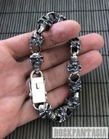 Брутальный серебряный мужской браслет с черепами - Киев