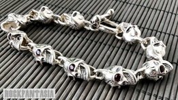 Серебряный мужской браслет с черепами с натуральными гранатами - Киев