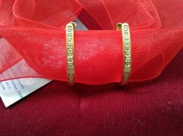 Серьги из серебра с позолотой и циркониями - Киев